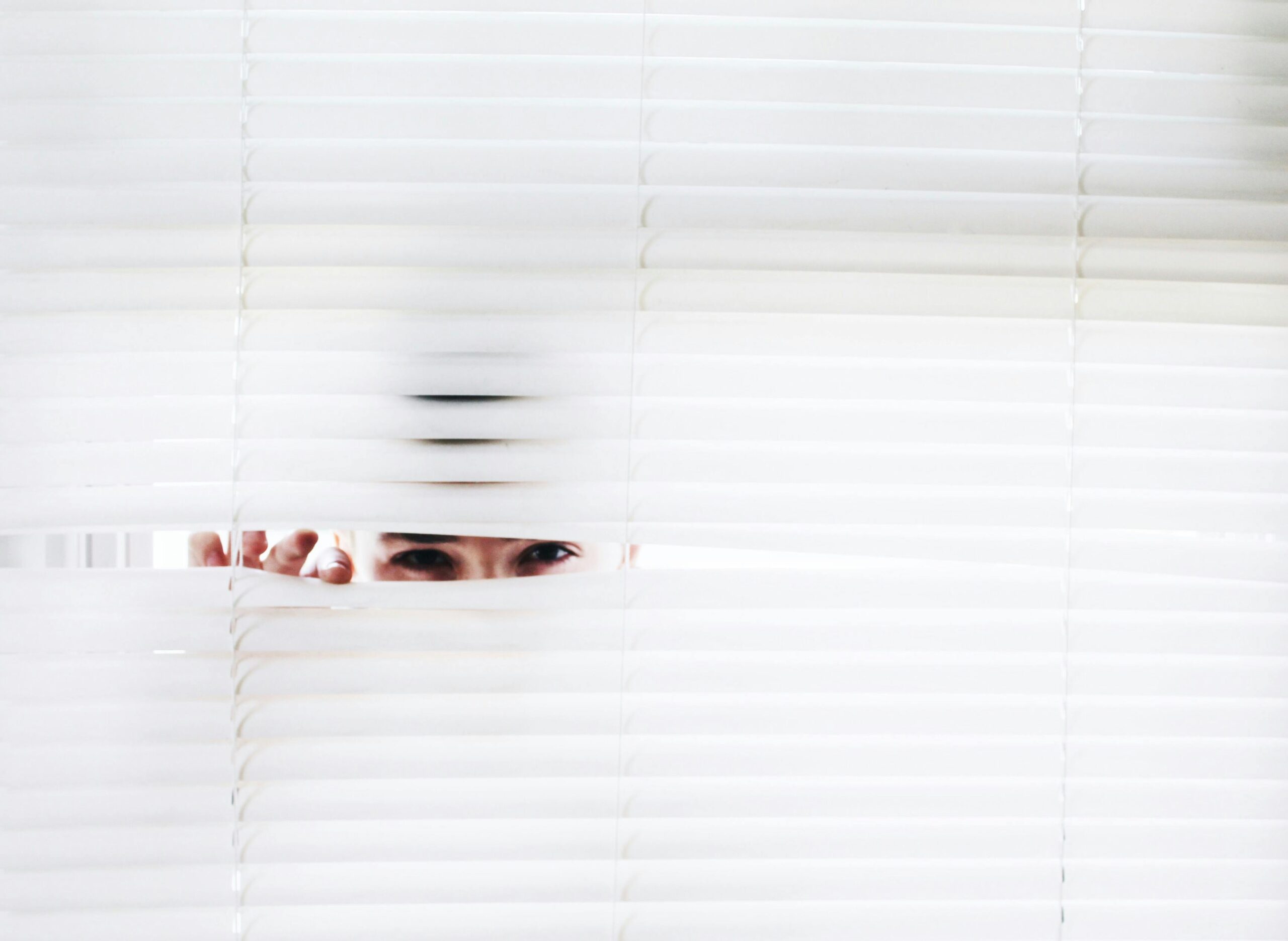 Person looking through the window
