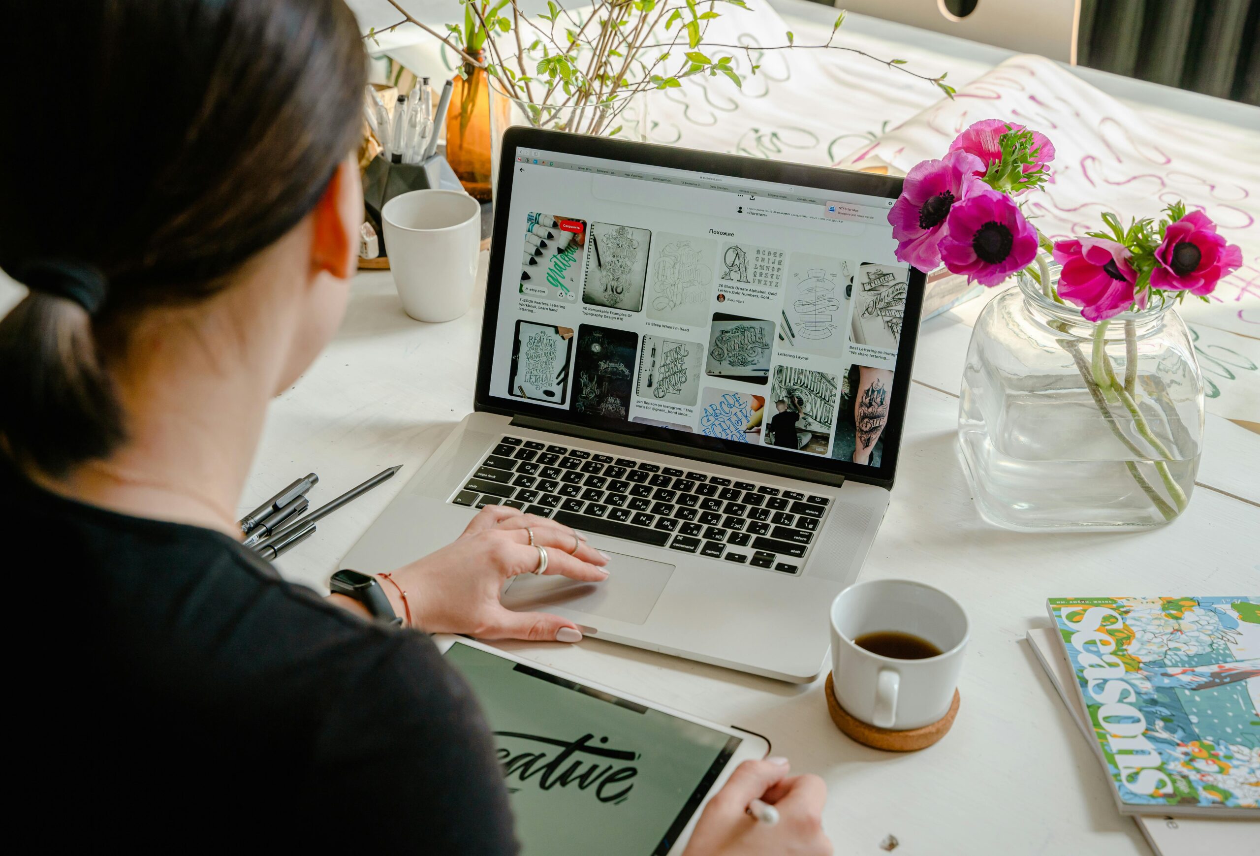 A Web Designer sitting at her computer